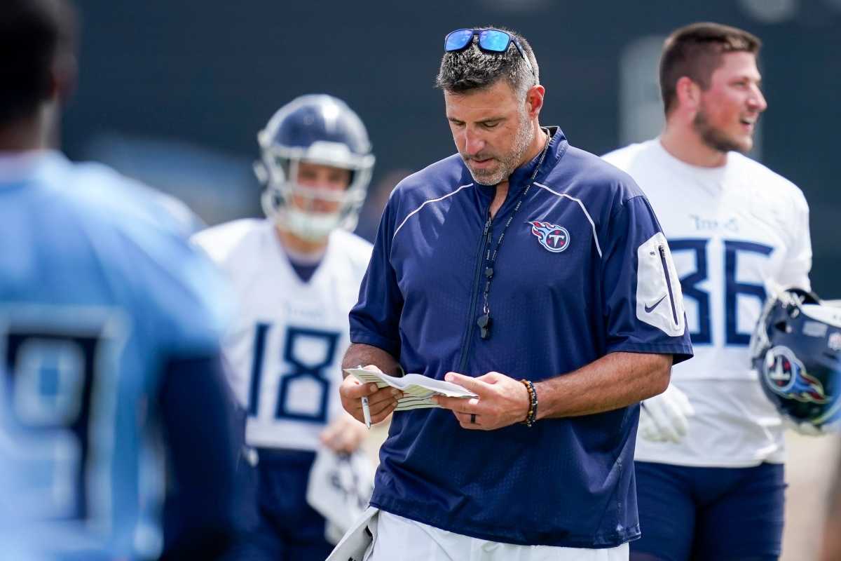 Tennessee Titans head coach Mike Vrabel looks down at a piece of paper